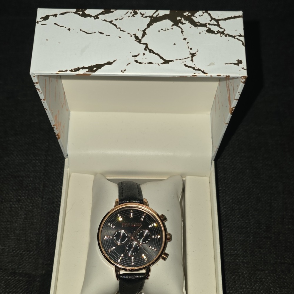Steve Madden womans Dress Quartz Wristwatch Gold Case Black Leather Band Analog